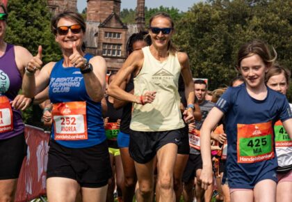 Close up of runners in front of Holker Hall in Cumbria.